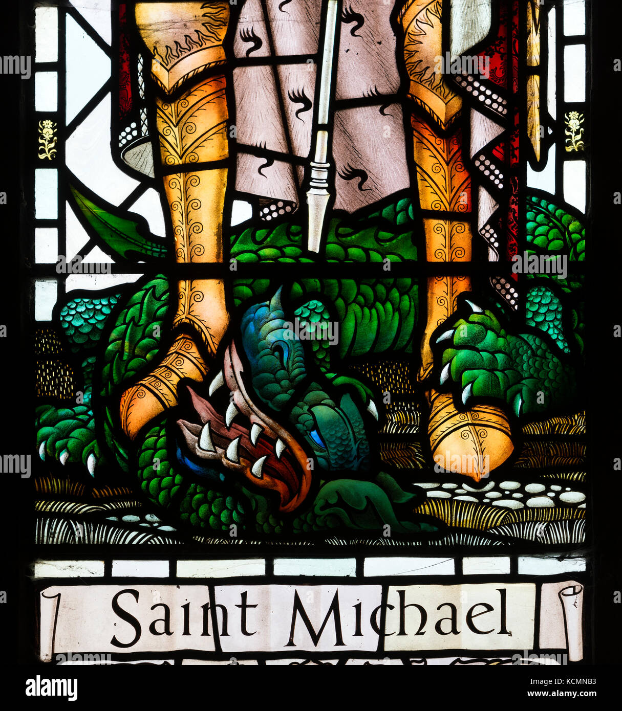 Saint Michael stained glass detail, St. Wilfrid`s Church, North Muskham, Nottinghamshire, England, UK Stock Photo